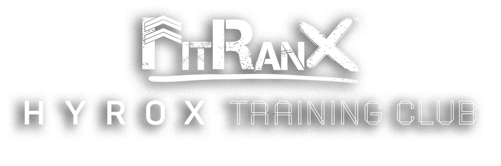 FitRanX HYROX Training Club Logo: Functional Fitness in Rivonia FitRanX HYROX Training Club logo. White text on a light gray background. The distressed "FitRanX" logo is on the left, with "HYROX TRAINING CLUB" in a clean, modern font on the right, signifying functional fitness training in Rivonia.